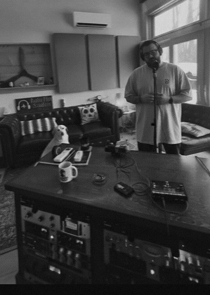 Aaron Michael recording vocals in his home studio